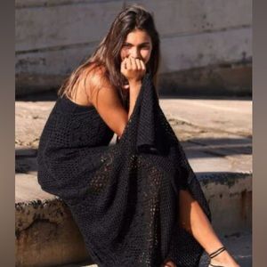 crochet maxi dress features a racer-style top and maxi-partial lining/slip under